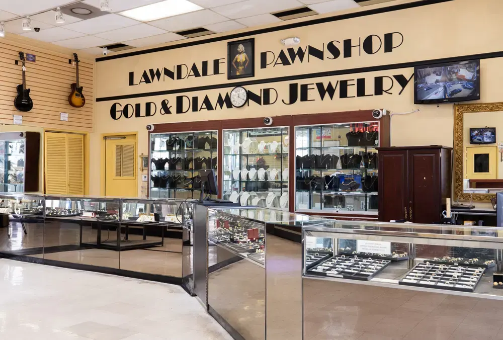 Inside Maxferd's Lawndale pawn shop, showcasing luxury items with visible signage