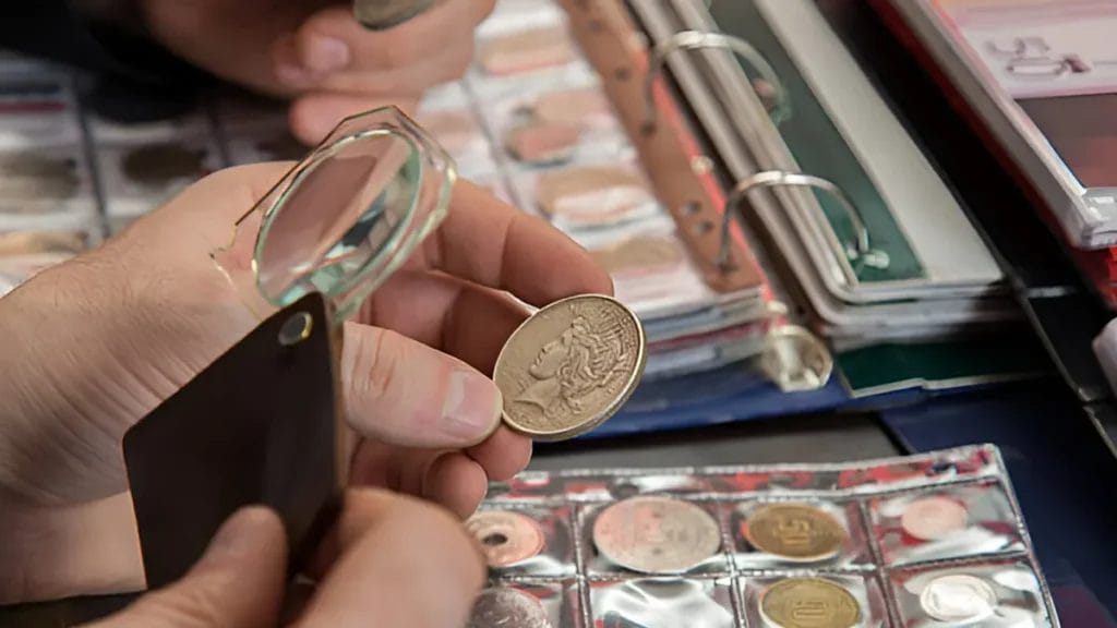 rare-coins-displayed-on-a-counter-featuring-various-historical-pieces